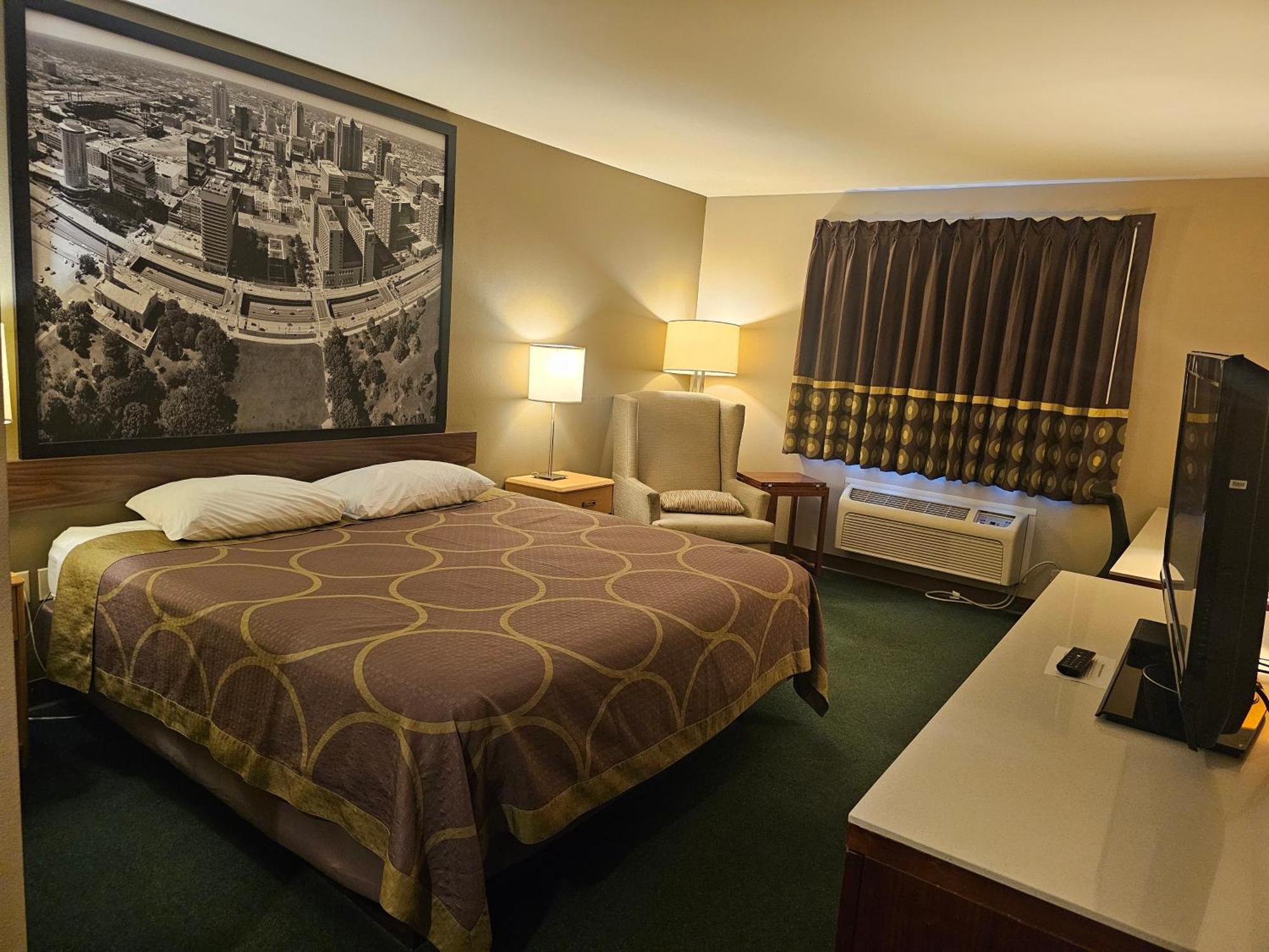 Super 8 By Wyndham Ava Motel Bagian luar foto